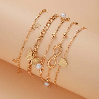 5-Piece Boho Tassel Anklet Set – Butterfly, Pearl, Star & Heart Beach Foot Jewelry